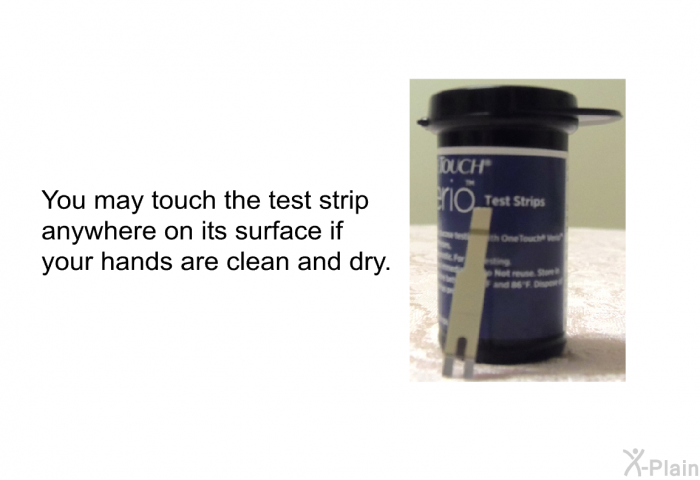 You may touch the test strip anywhere on its surface if your hands are clean and dry.