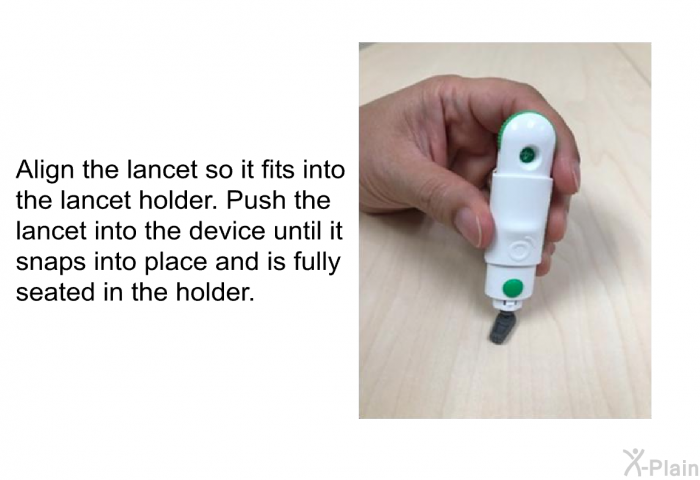 Align the lancet so it fits into the lancet holder. Push the lancet into the device until it snaps into place and is fully seated in the holder.