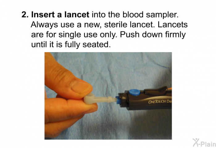 <B>Insert a lancet</B> into the blood sampler. Always use a new, sterile lancet. Lancets are for single use only. Push down firmly until it is fully seated.